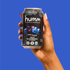Humm pouring into a chilled glass, showcasing fizziness and enjoyable serving suggestion