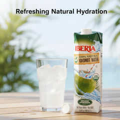 Iberia coconut water close-up on glass with clear liquid, naturally pure refreshment