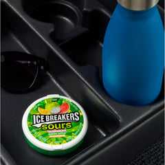 Ice Breakers tin in a jeans pocket demonstrating portability and on-the-go freshness