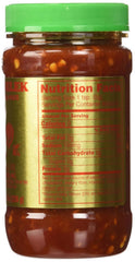 iMoZai paste coating chicken in a marinade adding bold spicy depth