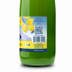 Italian Volcano bottle beside measuring glass showing 1L scale and portion control