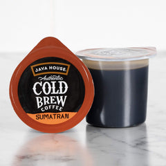 Java House pod pouring concentrate into cup for instant hot or iced convenience