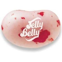 Close-up of Jelly Belly beans showing strawberry cheesecake color and glossy finish