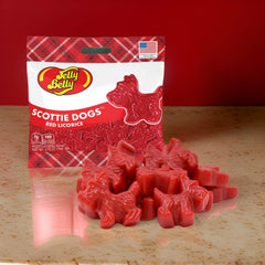 Jelly Belly pouch held in hand illustrating 2.75-ounce size and portability