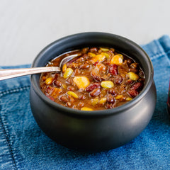 Close-up of Joan of Arc beans highlighting texture and hearty chili seasoning benefit