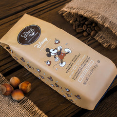 Joffrey's Coffee ground texture close-up displaying fine medium grind and visible flavor oils