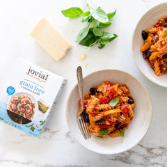 Jovial cooked cassava fusilli on plate showing firm bite and serving suggestion