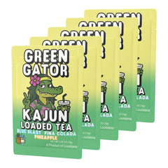 KaJun LOADED TEA mixed in a glass over ice showing refreshing tropical energy