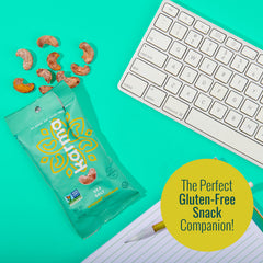 Karma cashew pack held in hand showing scale and perfect portion control
