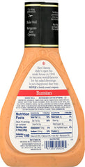 Ken's Steak House dressing drizzled over salad adding flavor and visual appeal