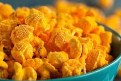 Kernel Season's powder texture macro shot showing fine cheese granules