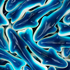Kervan scoop of blue shark gummies in a bowl ready for parties and serving convenience