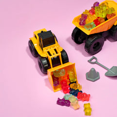 Kervan gummy bears next to scoop showing scale and portion control