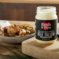 Kettle & Fire pouring tallow into skillet for high-heat cooking