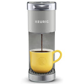 Keurig K-Mini Plus front view showing compact brewer and clean countertop benefit