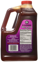Kikkoman sweet and sour sauce being poured as a glaze on grilled chicken, adding glossy flavor