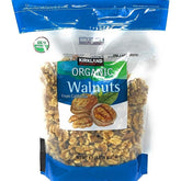 KIRKLAND front packaging of 1.7 lb bag showing organic walnuts and pantry-ready convenience