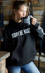 Koffee Kult open bag with beans emphasizing freshness and no surface oil