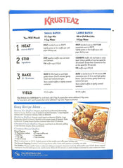 Krusteaz baked muffins on tray in cafe setting showcasing reliable rise and moist crumb