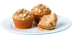 Krusteaz oat bran muffins on a plate showing warm, moist results for serving