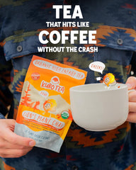 Kubo Lion's Mane brewed cup in lifestyle scene showing comforting energy benefit