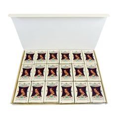 La Florentine torrone beside a cup of espresso for size and serving suggestion