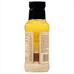 La Martinique bottle pouring vinaigrette to show pourability and bold flavor