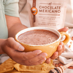 La Monarca steaming frothy hot chocolate in cup showing creamy foam