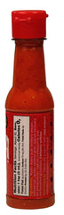 La Perrona bottle in hand demonstrating portable 5oz size and convenience