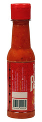 La Perrona close-up of sauce texture highlighting thick, vibrant red consistency