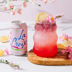 LaCroix poured in a glass with ice showing crisp floral benefit