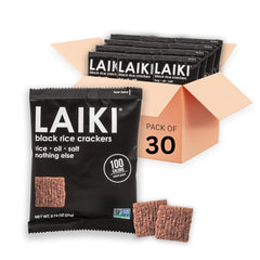 LAIKI crackers served with hummus showing versatile snack pairing benefit