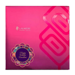 Laumière Gourmet Fruits open box overhead view displaying sweets and rakhis benefit clear contents