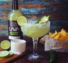 LAVA mix pouring into a glass demonstrating quick cocktail preparation