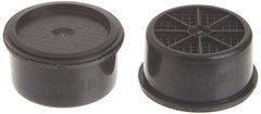 Lavazza capsule beside a ruler showing 0.25 oz portion size clarity