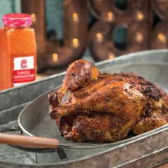 Lawry's rubbed pork chops on grill with caramelized crust, showcases juicy sear and visual appeal