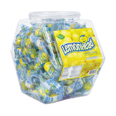 LEMONHEAD clear tub front view showing 180 individually wrapped lemon candies and reusable lid for easy serving