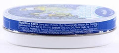 Hand holding a 1.75 oz Les Anis de Flavigny tin showing portable size and convenience