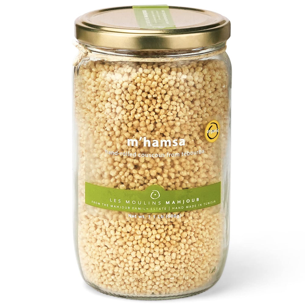 Les Moulins Mahjoub front packaging showing organic hand-rolled couscous with artisanal benefit