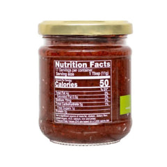 Les Moulins Mahjoub harissa spread on bread demonstrating serving idea and bold taste boost