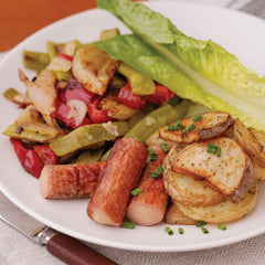 Libby's Vienna sausages sizzling in a skillet for warm serving