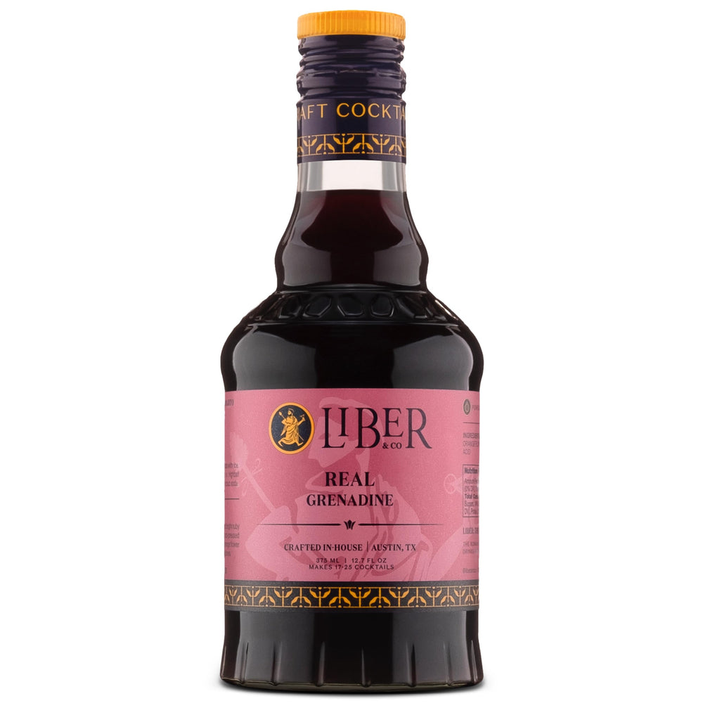 Liber & Co. front bottle view showing ruby-red color and premium packaging