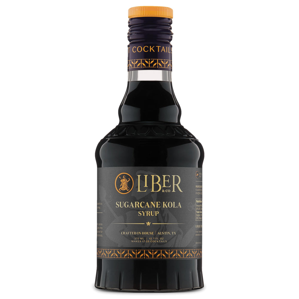Liber & Co. bottle front view showcasing premium kola syrup and label benefits