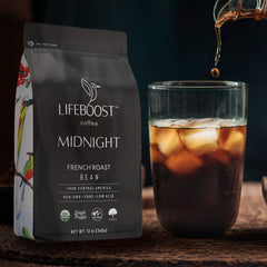 Lifeboost roasted beans in hand demonstrating rich full-bodied aroma