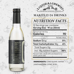 Liquid Alchemist close-up label displaying non-GMO and vegan benefits