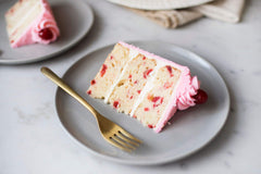 Cupcake with strawberry buttercream flavored with LorAnn Oils, showcasing vivid bakery taste