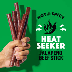 Lorissa's Kitchen single unwrapped beef stick revealing texture and spice benefit: ready-to-eat protein