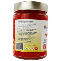 Spoonful of L'Oro Del Sud sliced Calabrian peppers ready to add quick heat and flavor