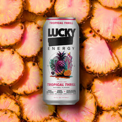 Lucky Energy can next to coffee mug illustrating 16oz serving and stronger caffeine per can