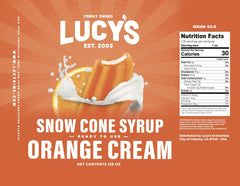 Lucy's syrup drizzled on shaved ice, enhancing flavor and visual appeal